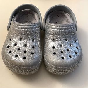 Crocs. Size:7c. Sparkly silver.
